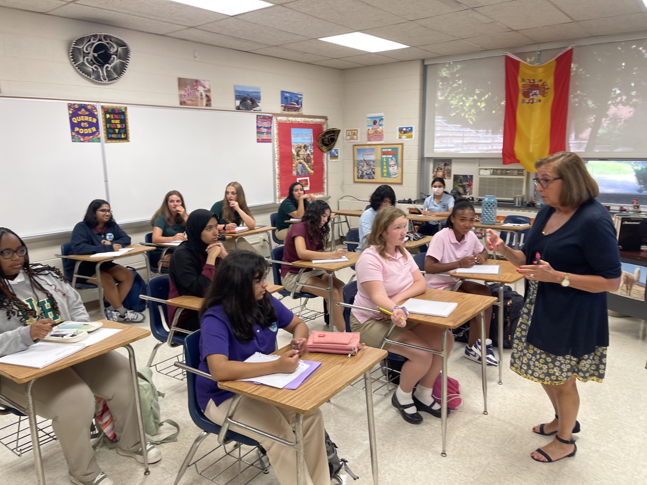 Students in class with teacher in front