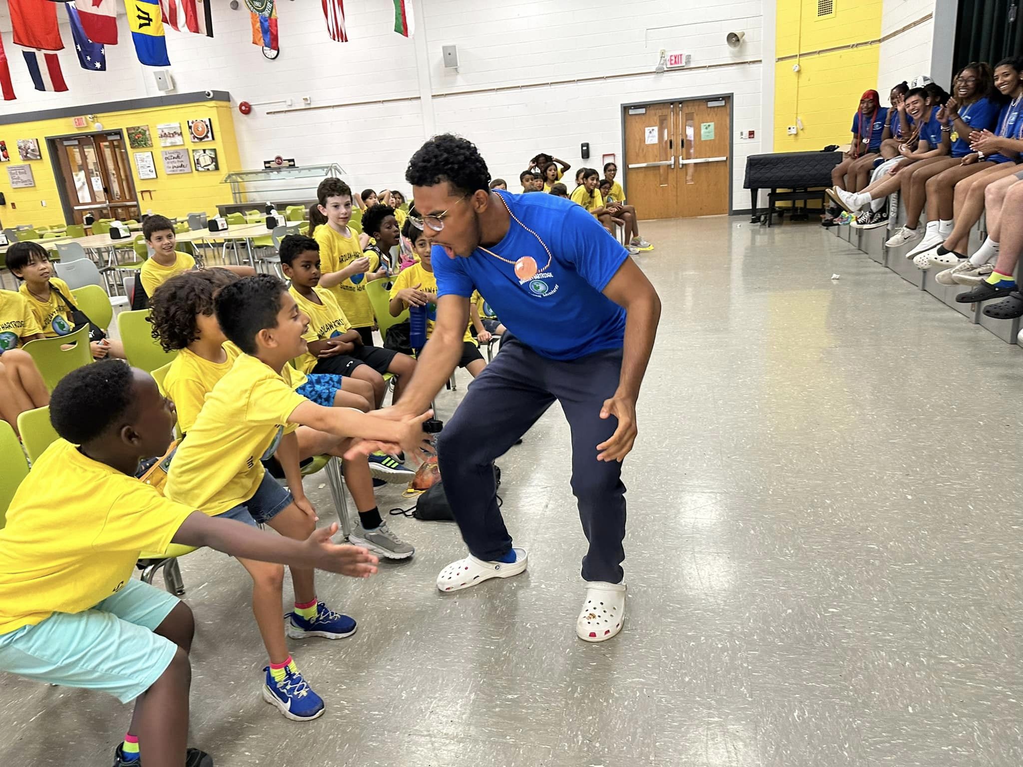Staff shaking campers hands